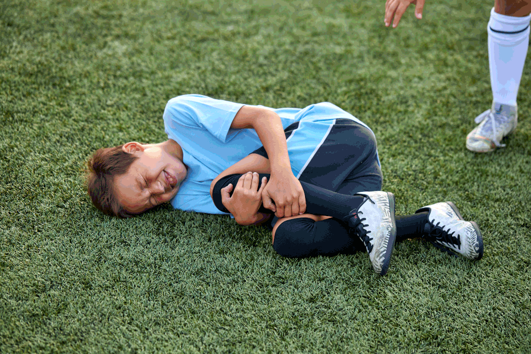 Young athlete receiving chiropractic care as part of a sports injury recovery and rehabilitation plan