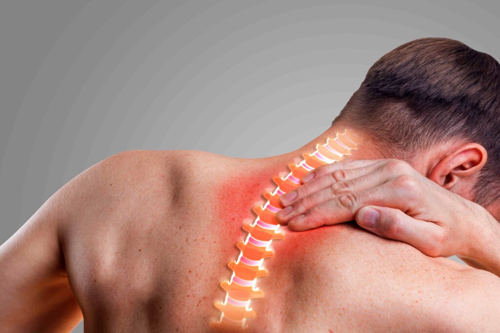 Patient receiving massage therapy for neck pain and muscle tension